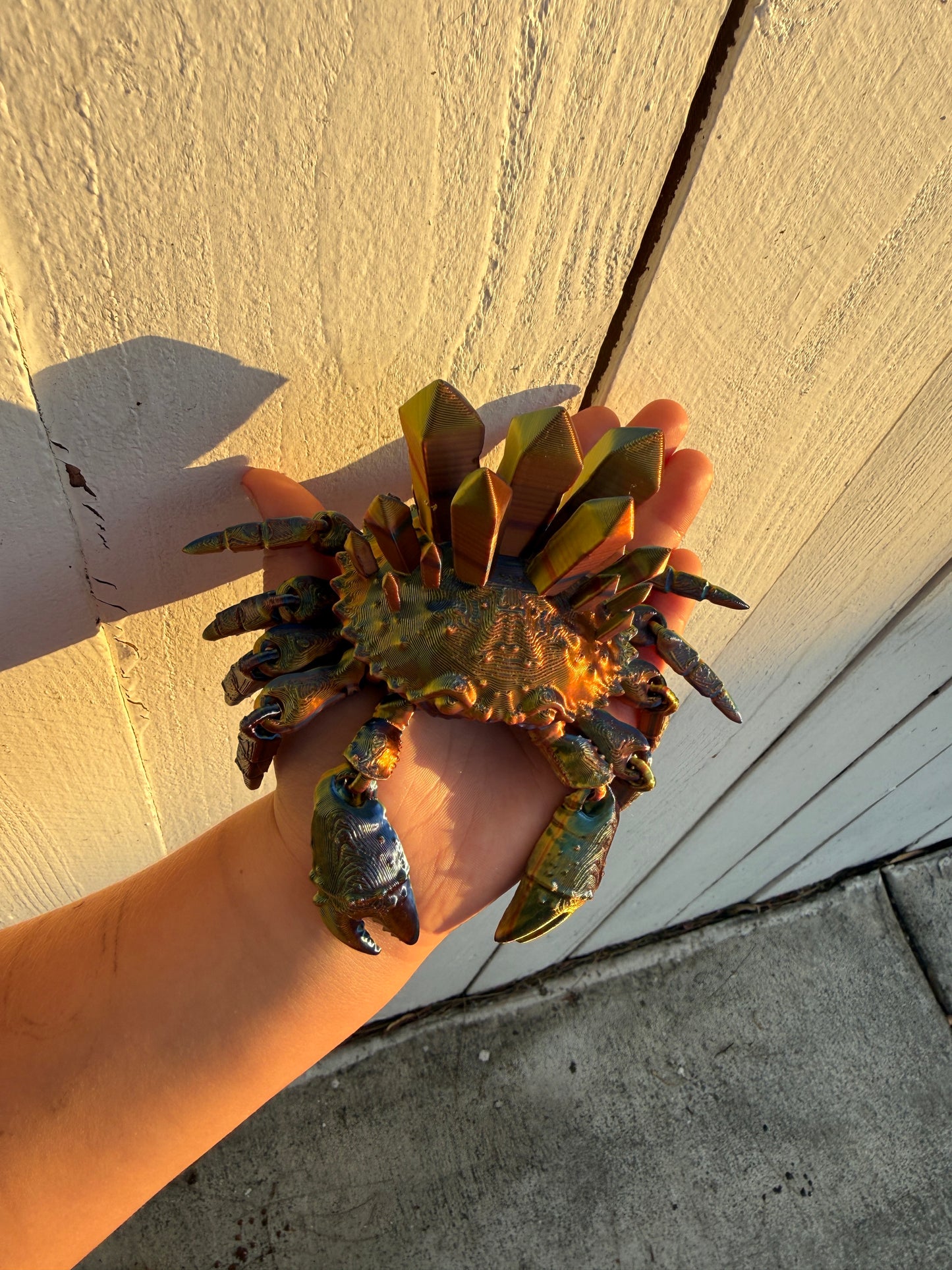 Rainbow crystal crab 3D print held in hand front view